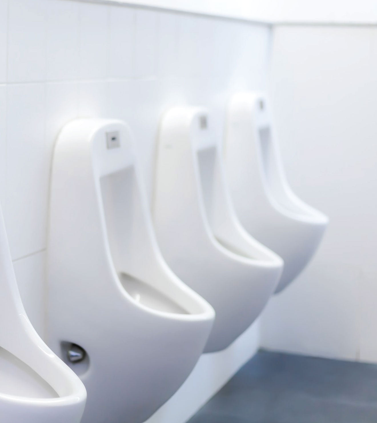 Sanitized urinal in a commercial space, cleaned with Powerit disinfectant toilet cleaner